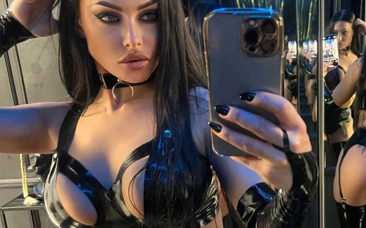 Evil Woman wearing Westward Bound latex clothing in Saska Kępa, Warsaw, Poland
